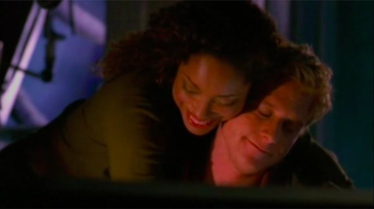 Wash and Zoe hugging